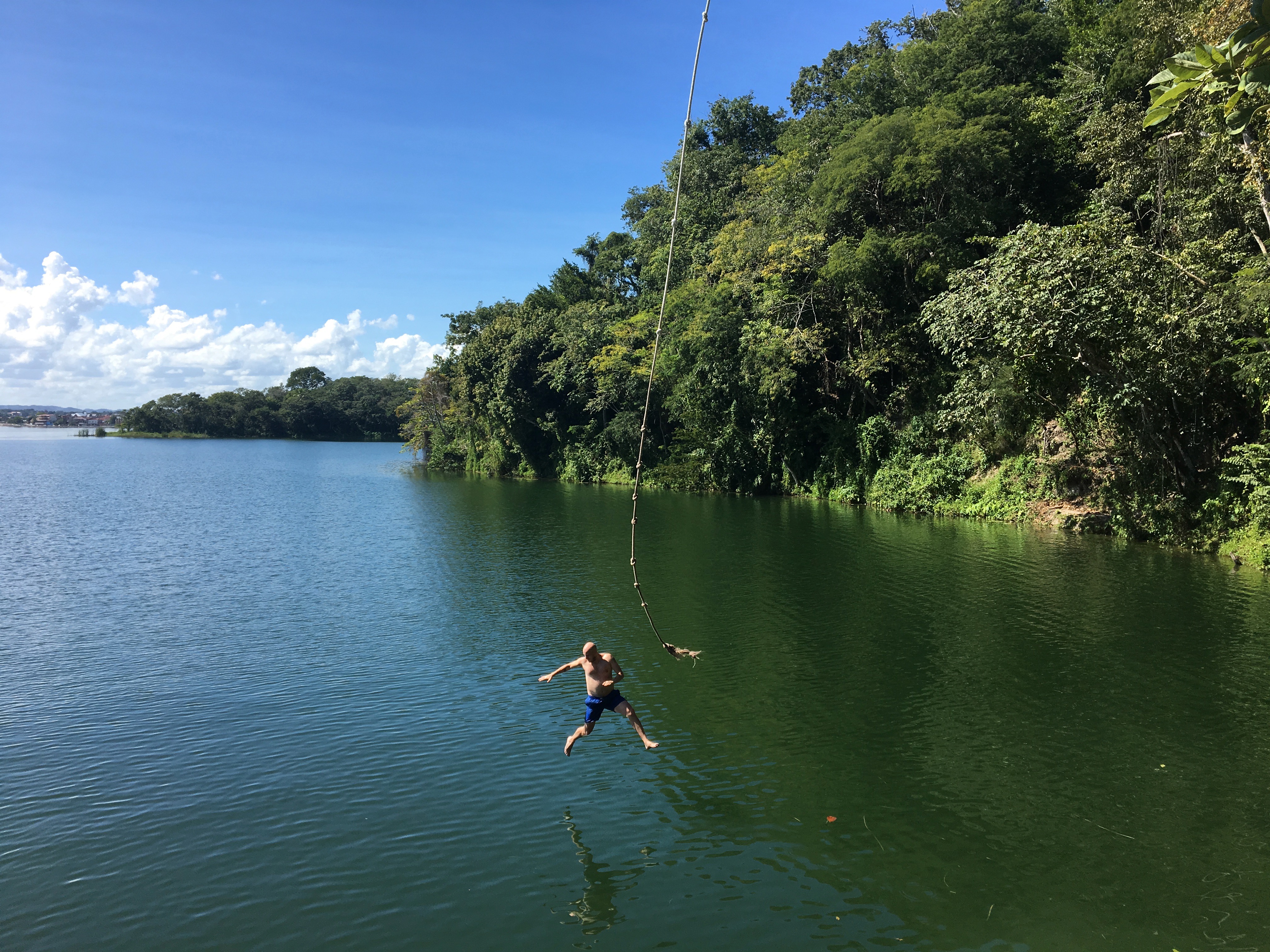 Rope Swing on Lake Petén Itzá, Guatemala