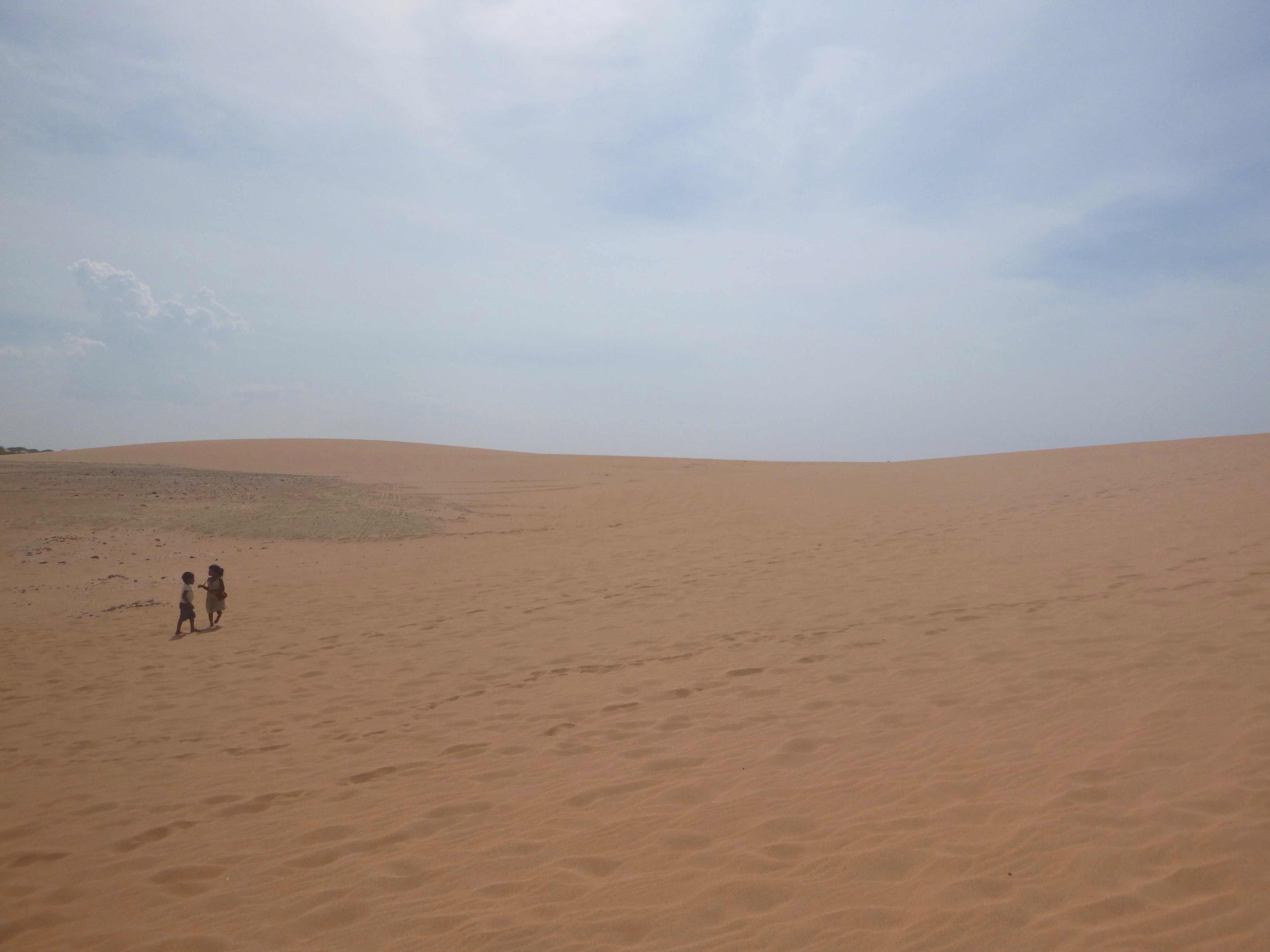 Wayuu children explore the Dunes of Taroa