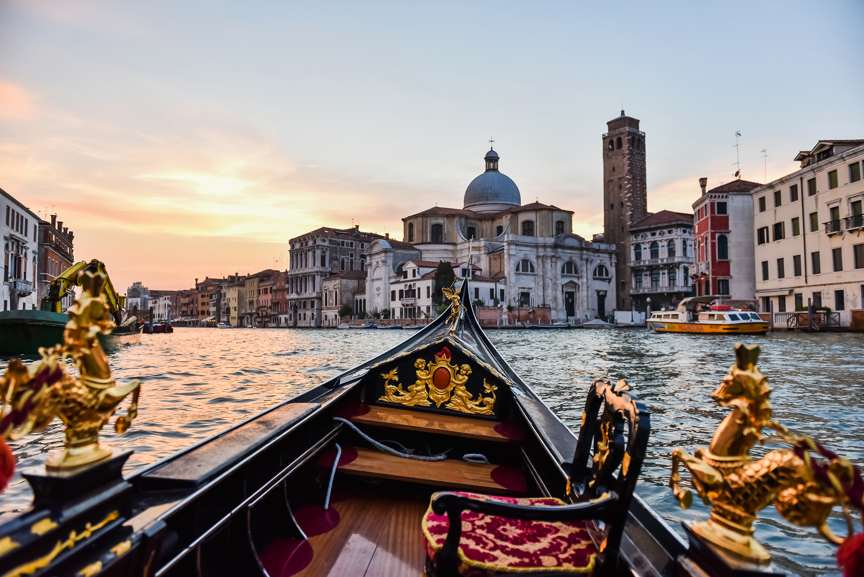 Gondola Ride At Sunset in Italy
