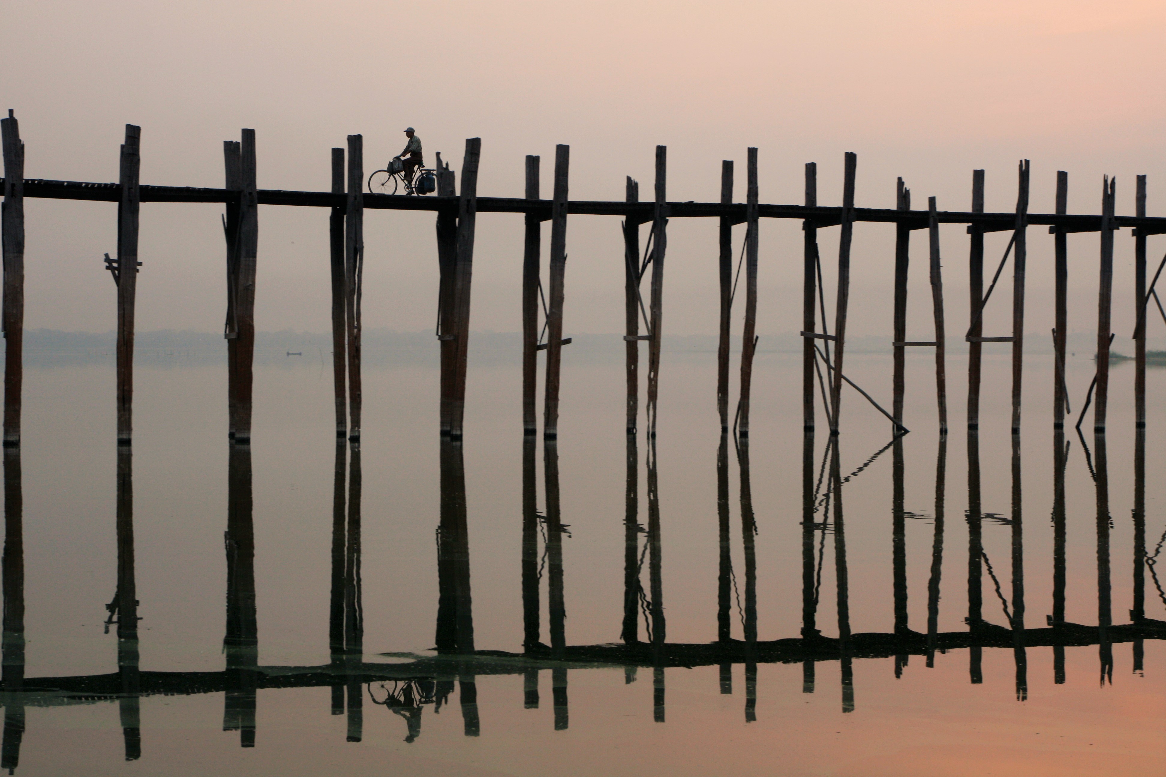 Early morning commute on the world’s oldest teakwood bridge (U Bein Birdge, Myanmar)
